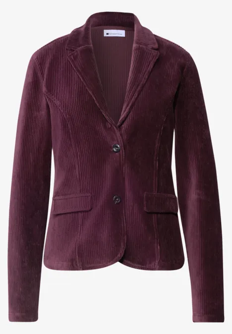 Blazer cintré en velours côtelé violet foncé, col cranté et fermeture à deux boutons.