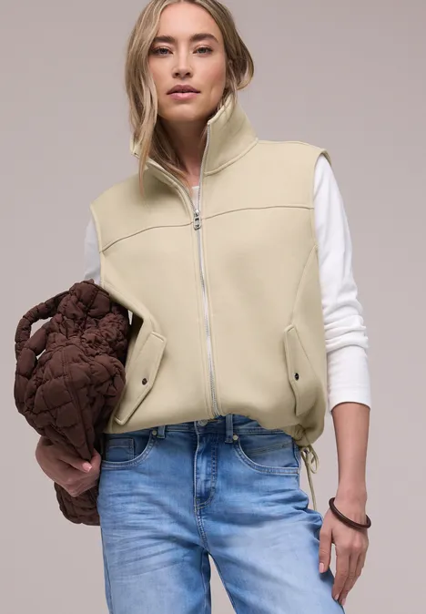 Gilet court avec cordon de serrage smoke beige mel. Gilet court avec cordon de serrage smoke beige mel.