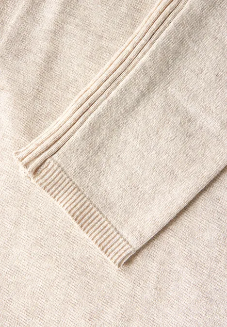 Langer Cardigan sheer beige mel.