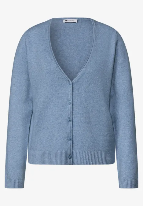 Cardigan à col en V et patte de boutonnage northern blue mel. Cardigan en maille bleu clair, col en V, coupe légèrement ajustée et boutons.