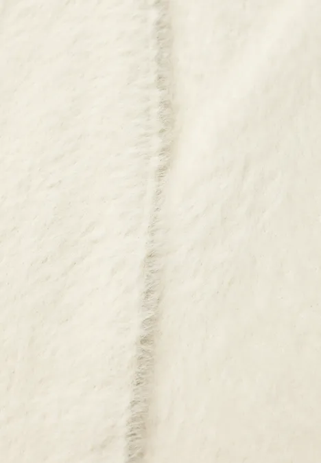Tissu duveteux crème avec couture