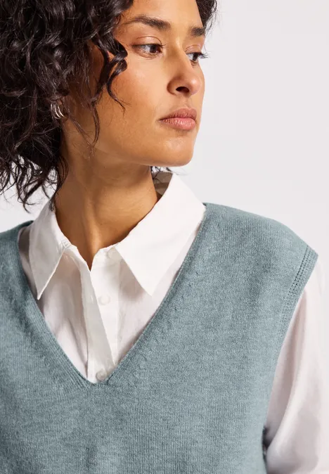 Mouwloze trui met V-hals nile blue mel.