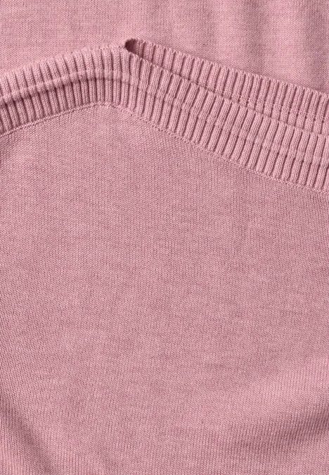 Rosa Strickstoff mit feinem Rippenmuster und abgesetzter Naht
