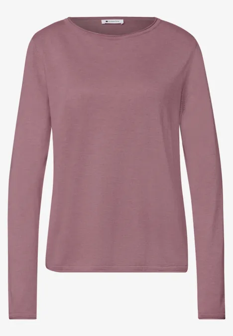 Rosa Langarmshirt mit Rundhalsausschnitt, schlichter, leicht taillierter Schnitt.