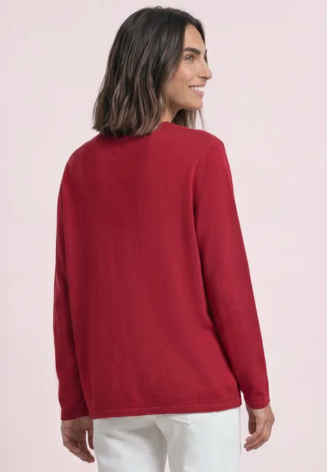 Trui met ronde hals en omgeslagen randen inferno red Achteraanzicht van een vrouw met rode trui en witte broek voor een lichte achtergrond.