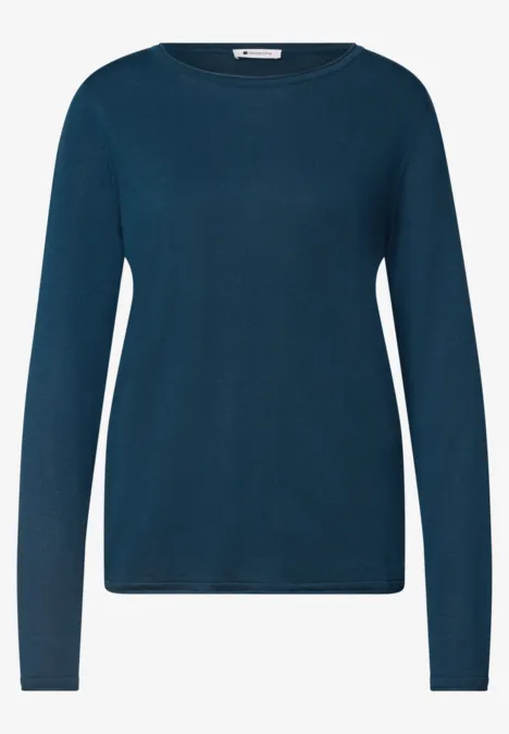 Dunkeltürkisfarbener Pullover mit Rundhalsausschnitt und langen Ärmeln.