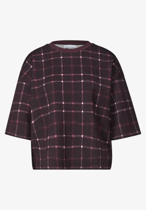 Dunkles, kastiges Kurzarmshirt mit rosafarbenem und weißem Karomuster.