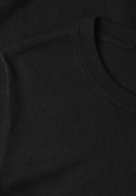 T-shirt met korte mouwen en ronde hals in effen kleur Black Close-up van een zwart T-shirt.