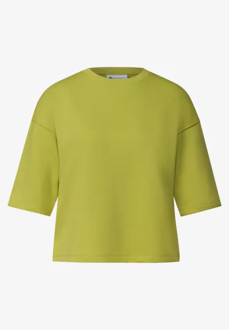 Sweatshirt met korte mouwen en ronde hals apple lime Lime-grünes, kastiges Cropped-T-Shirt mit kurzen Ärmeln und Rundhalsausschnitt.