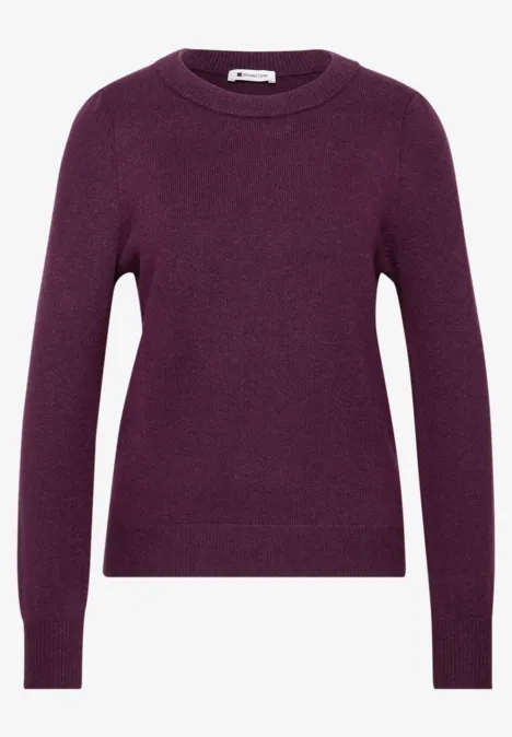 Ein einfaches lila Rundhals-Pullover mit langen Ärmeln.