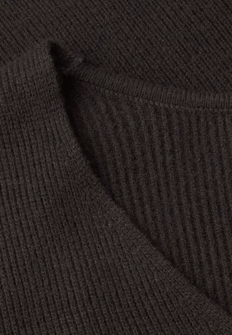 Nahaufnahme eines schwarzen Strickstoffs mit feinem Rippmuster.
