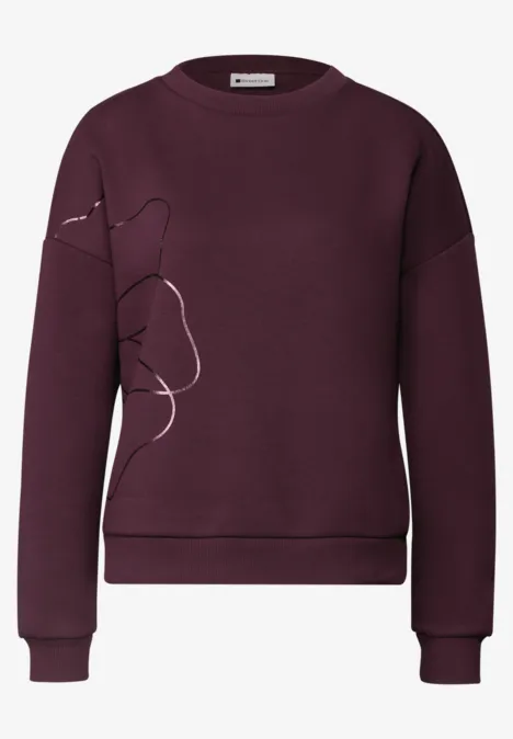 Bordeauxfarbener Pullover mit minimalistischer Linienzeichnung, lässigem Schnitt und langen Ärmeln.