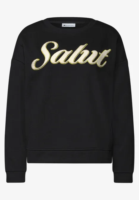Schwarzer Sweatshirt mit goldener „Salut“-Schrift auf der Vorderseite.
