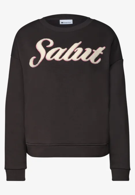 Sweatshirt met lange mouwen en Artwork black coffee Schwarzer lässiger Pullover mit dem Aufdruck 'Salut' in auffälliger Schrift auf der Vorderseite.