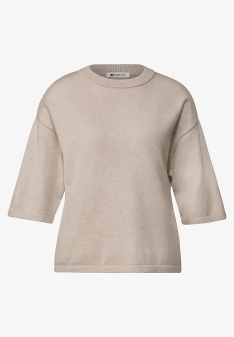 Beige gebreide top met halflange mouwen