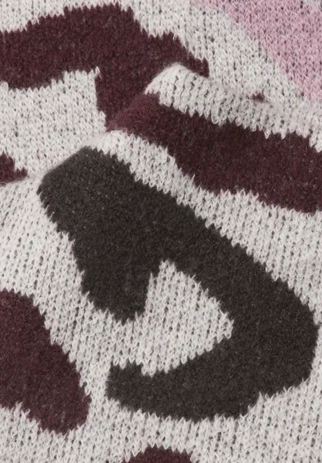 Tissu tricoté épais et duveteux avec motif abstrait en blanc, gris, noir et bordeaux.