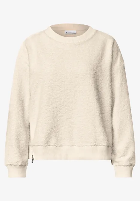 Beige Fleece-Sweatshirt mit Rundhalsausschnitt und langen Ärmeln.