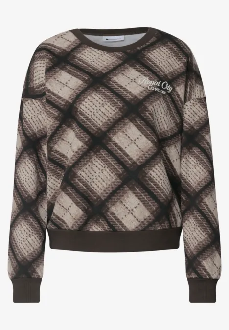 Beiger Pullover mit schwarz-braunem Karomuster und elastischen Rippbündchen.