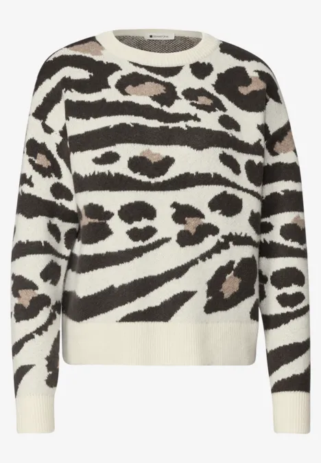 Ecru trui met zwarte en bruine dierenprint in een gestreept design.