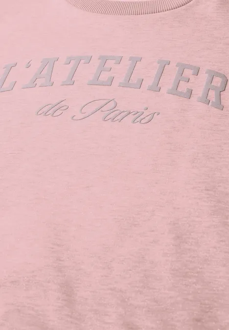 Rosa T-Shirt mit aufgedrucktem Schriftzug 'L'ATELIER de Paris' an der Brust
