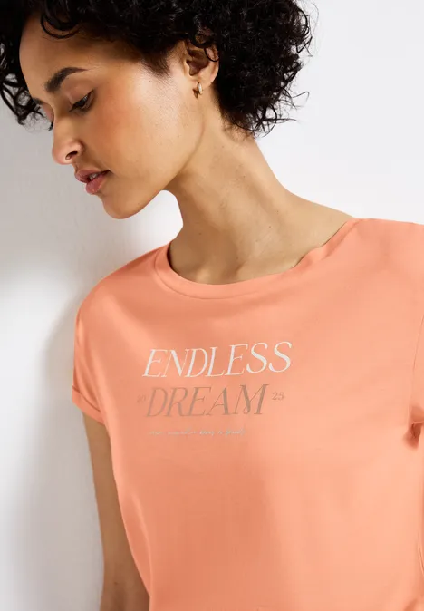 T-Shirt mit Wording creamy orange