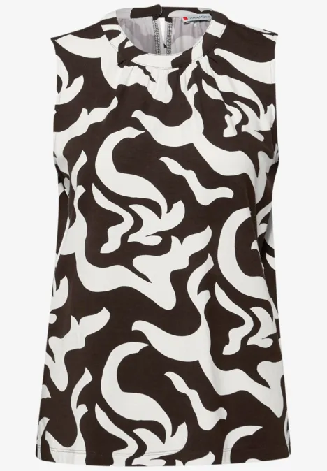 Top sans manches noir à motif abstrait blanc