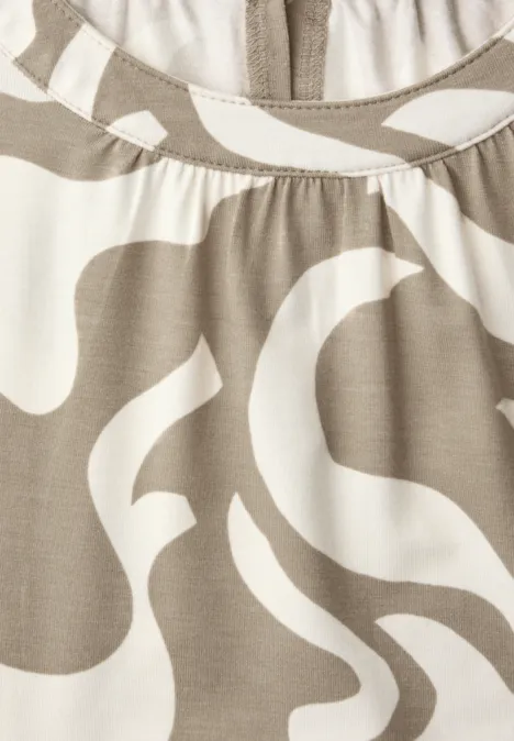 Beige-witte blouse met abstracte, golvende vormen