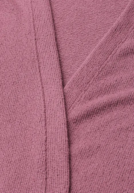 Veste à manches longues en look tricot dark clouded blush Gros plan sur un tissu texturé rose avec couture