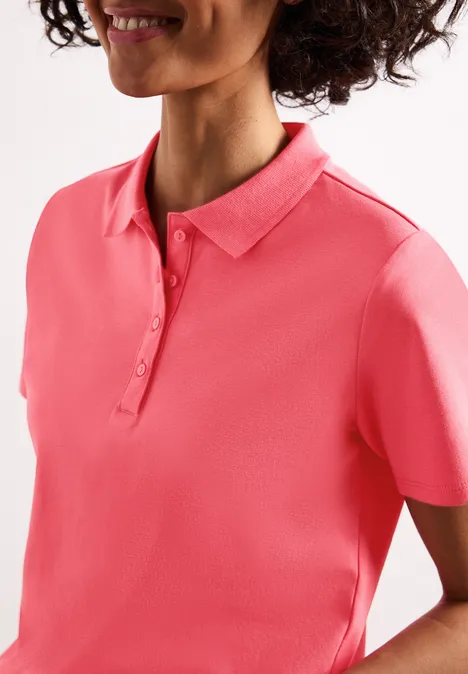 Kurzarm Poloshirt in Rippstruktur striking coral Kurzarm Poloshirt in Rippstruktur striking coral