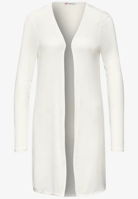 Lang wit gebreid vest met lange mouwen en open voorzijde tot op de knie.