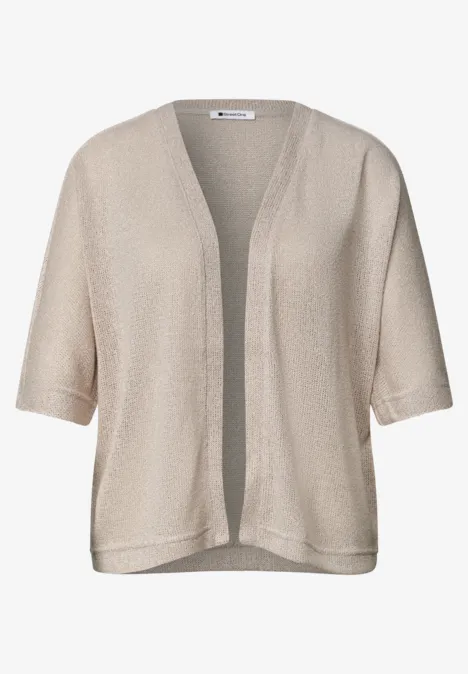 Licht beige, openvallend vest met korte mouwen van fijne gebreide stof.