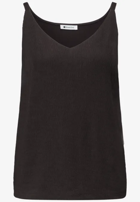 Schwarzes ärmelloses Damen-Top mit V-Ausschnitt und schmalen Trägern.