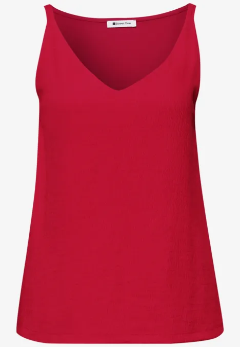 Rotes ärmelloses Damen-Top mit V-Ausschnitt.