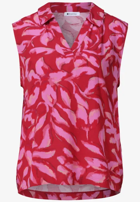 Rotes ärmelloses Damen-Top mit V-Ausschnitt und abstraktem pinken Blumenmuster.