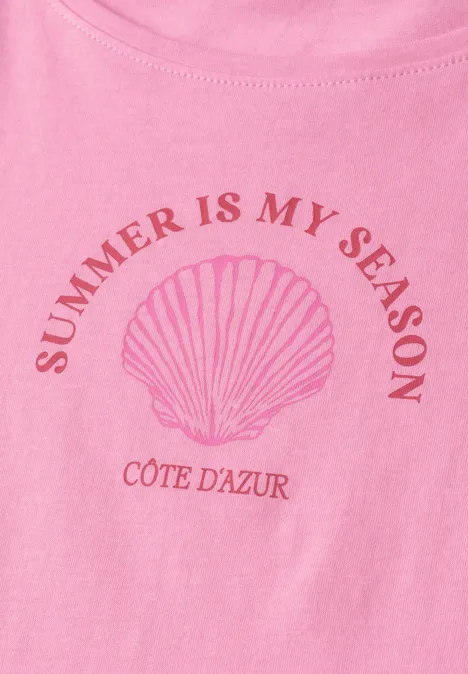 Rosa Shirt mit Muschel-Illustration und Text 'SUMMER IS MY SEASON' sowie 'CÔTE D'AZUR'.