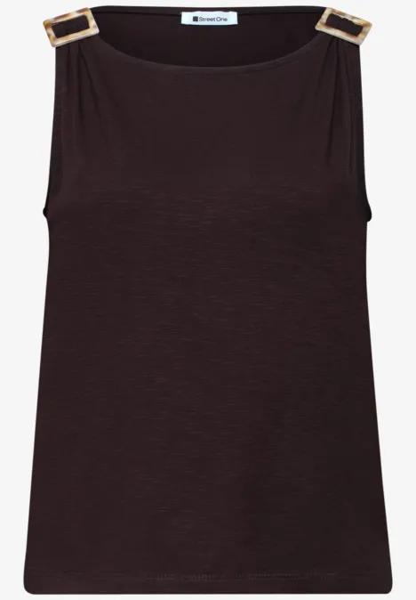 Mouwloze donkerbruine top met goudkleurige schouderbanden en vierkante gespen.