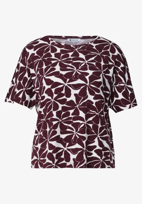 Wit dames T-shirt met korte mouwen en groot bordeaux bloemmotief.