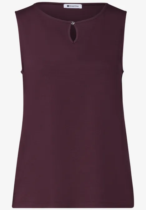 Haut sans manches, coupe ample en violet foncé avec une petite découpe en forme de larme au col rond.