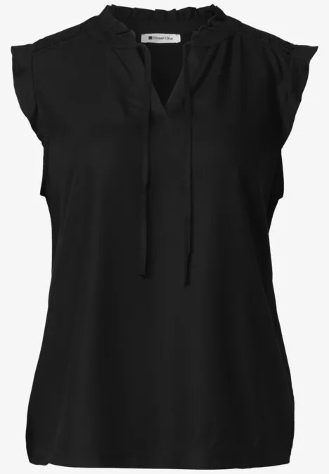 Zwarte mouwloze blouse met V-hals, subtiel ruchesdetail en sierlintjes bij de hals