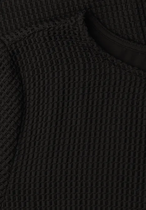 Schwarzer, strukturiert gewebter Waffelstrickstoff mit feiner Musterung.