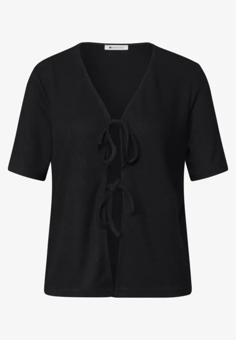 Veste en maille avec rubans Black Cardigan court noir en maille, manches courtes et deux nœuds sur le devant.