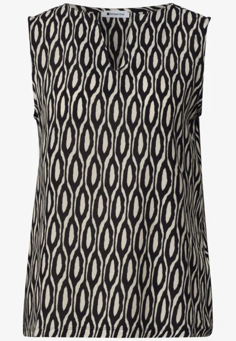 Mouwloos topje met organisch zwart-beige ovalen patroon en kleine V-hals, modern en veelzijdig.