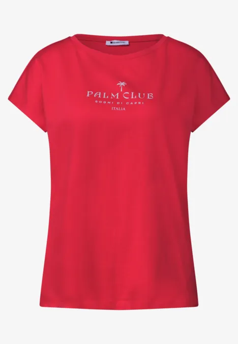 Dropped Shoulder Shirt mit Wording salsa red Ein rotes Damen-T-Shirt mit 'Palm Club'-Schriftzug in Weiß auf der Brust.