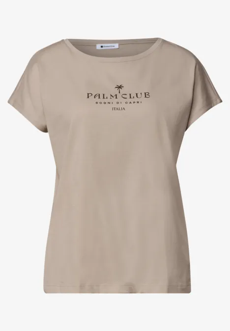 Koszulka na ramiączkach z napisem clay sand Beżowy damski T-shirt z nadrukiem 'Palm Club 1989' i delikatnym motywem palm.