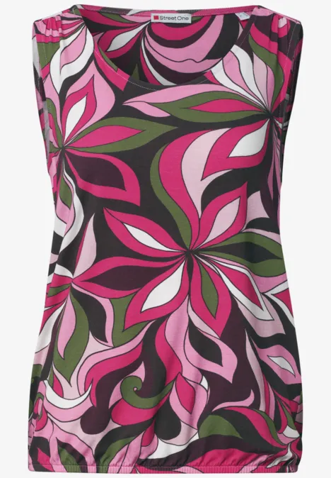 Ärmelloses Top mit abstraktem Blumenmuster in Pink, Grün, Weiß und Schwarz.