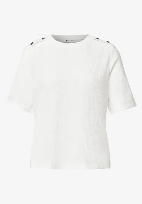 T-shirt à col rond avec boutons off white Haut blanc à manches courtes, épaule ornée de boutons discrets.