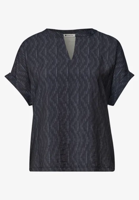 Top ample à manches courtes, encolure V et motif discret, bleu foncé ou noir