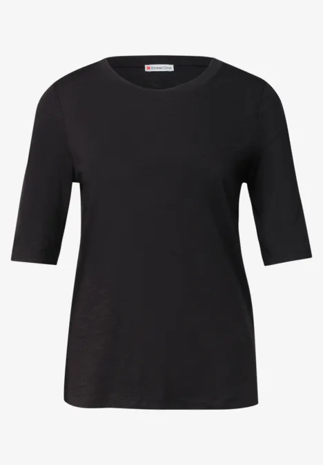 Basic Shirt met ronde hals in Unifarbe Black Zwart T-shirt met halve mouwen en ronde hals, eenvoudig, aansluitende damestop.
