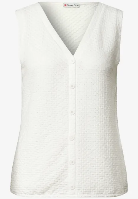 Top met V-hals en decoratieve knoopsluiting off white Witte mouwloze top van gestructureerde katoen met V-hals en knoopsluiting voor.