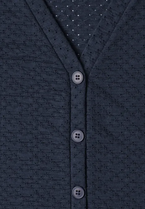 Dunkelblaue Strickjacke mit feiner Struktur und Knopfleiste.
